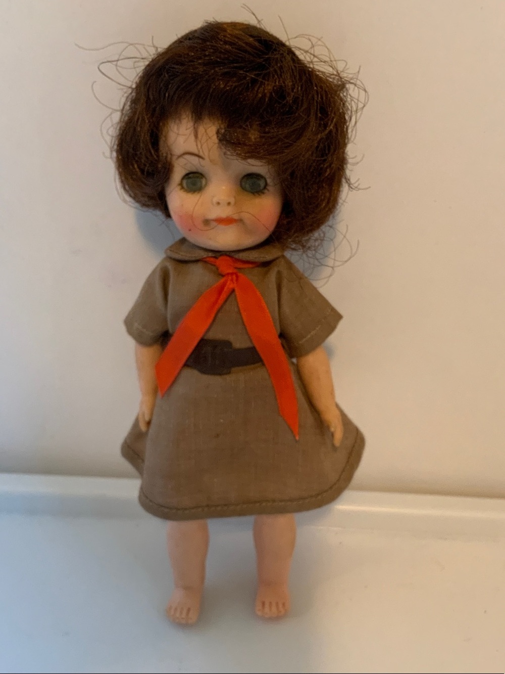 Classic Girls' Doll in Brown Dress with Red Scarf